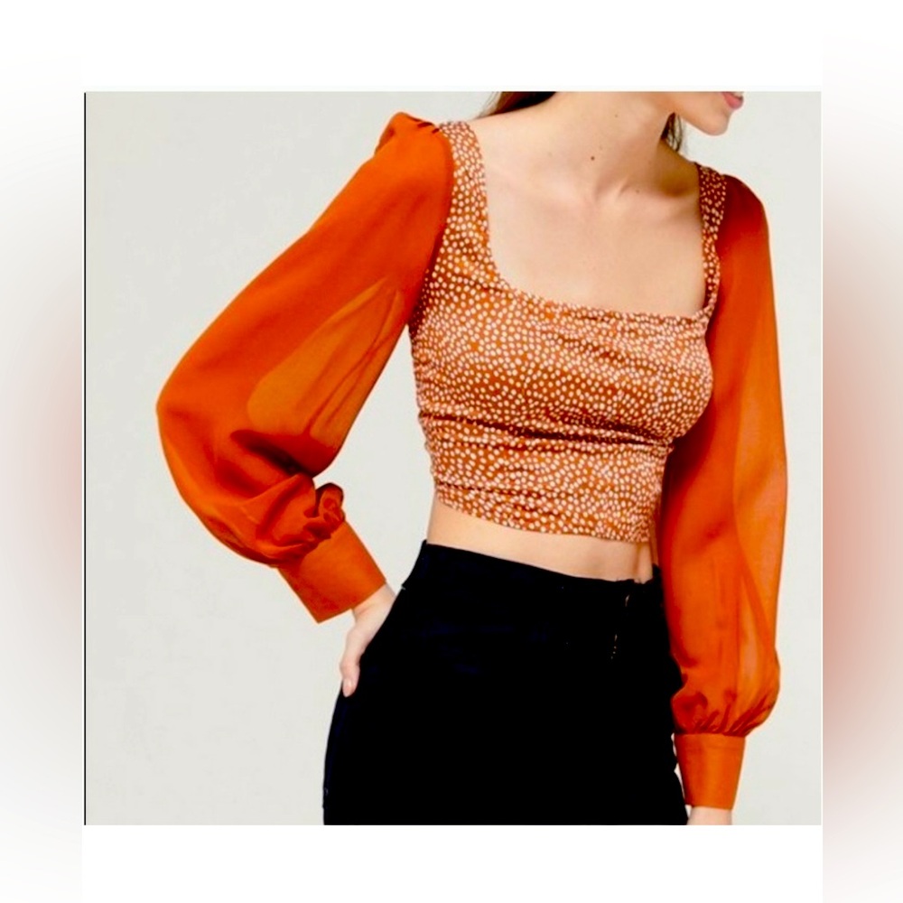 URBAN OUTFITTERS 
Medium size top 
Orange color 
Blouse top